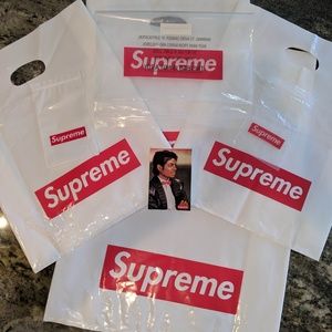 Seven (7) Supreme Shopping Bags